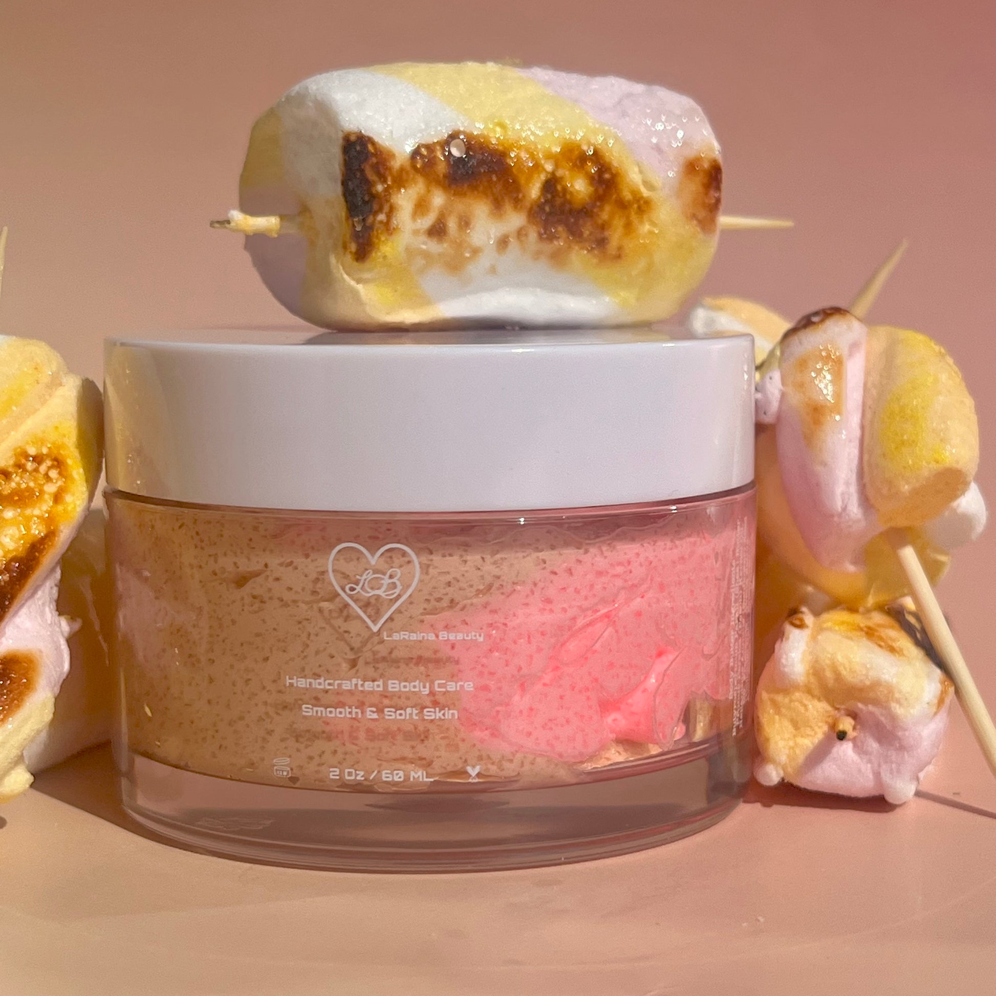 caramel Vanilla toasted Marshmallow body scrub. A foaming/cleansing and exfoliating gentle body scrub to achieve smooth soft skin. UK handmade Vegan skincare that brings a fun luxurious experience to self care and shower routines. Scrub and get rid of patchy dry skin, clogged pores and ingrown hairs. The best body scrub you could ever ask for.