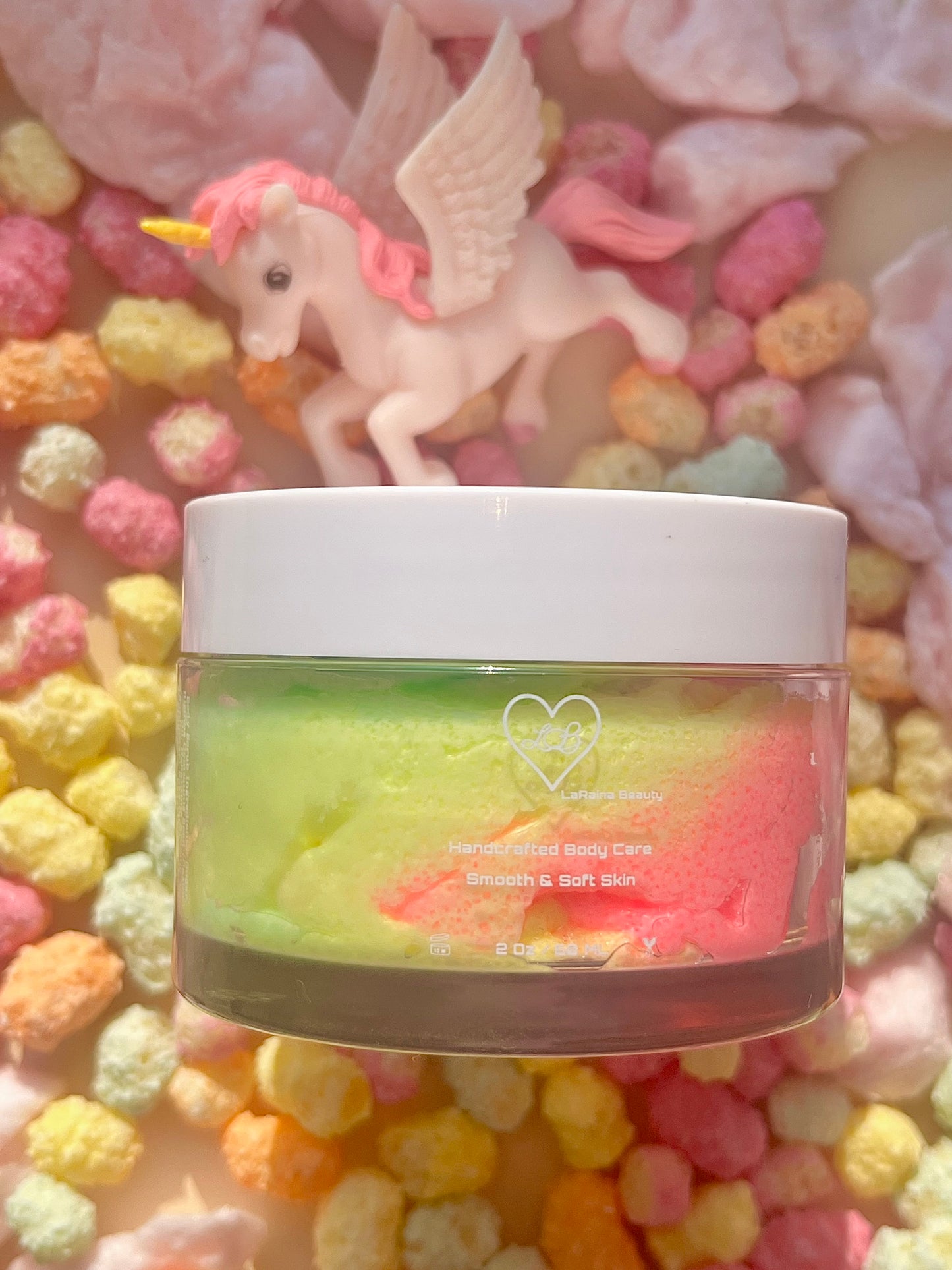 multicoloured unicorn body scrub, summer fruit body exfoliant. A foaming/cleansing and exfoliating gentle body scrub to achieve smooth soft skin. UK handmade Vegan skincare that brings a fun luxurious experience to self care and shower routines. Scrub and get rid of patchy dry skin, clogged pores and ingrown hairs. The best body scrub you could ever ask for.