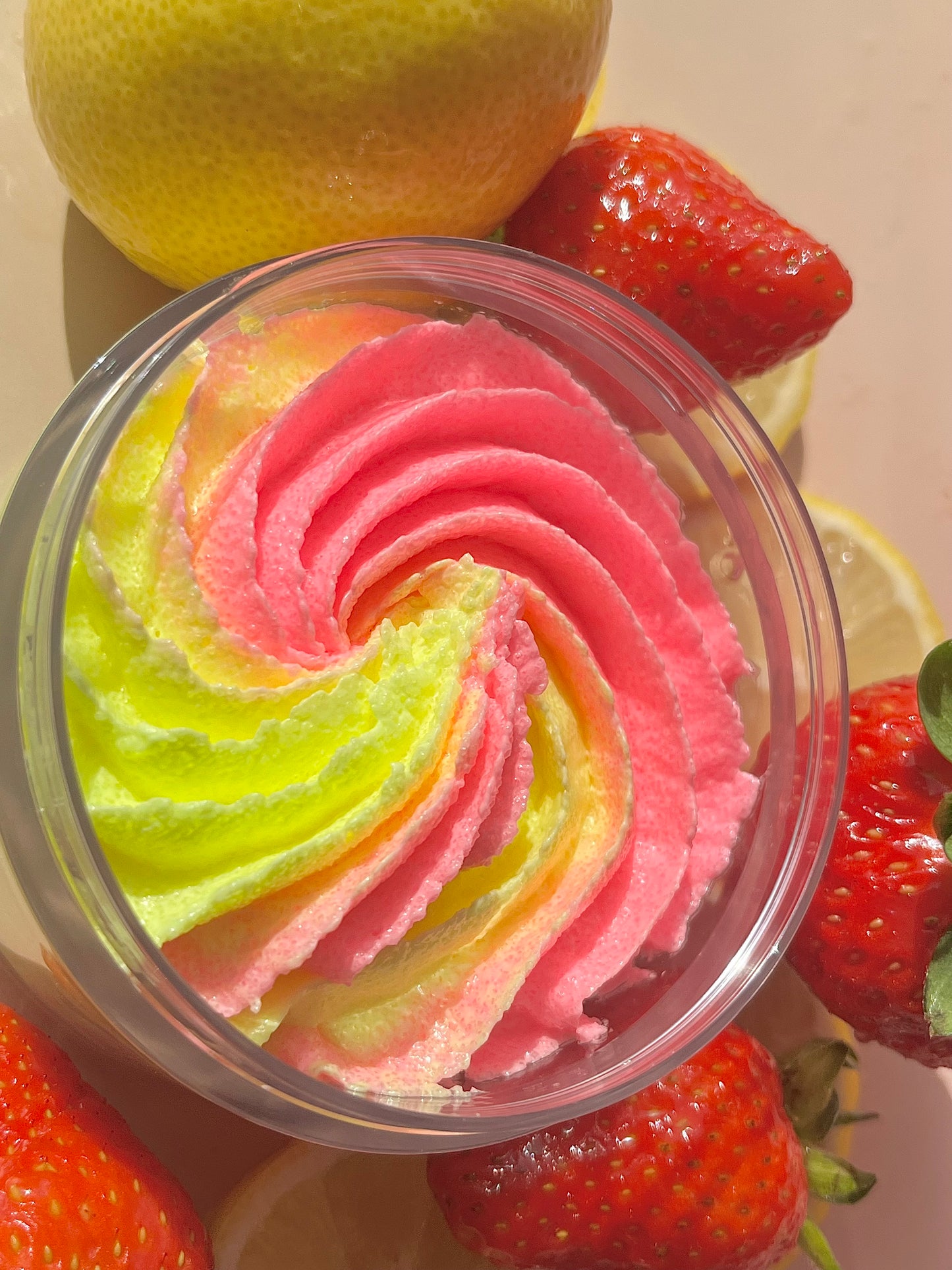 Summer Fruity Strawberry, Pink lemonade exfoliant. A foaming/cleansing and exfoliating gentle body scrub to achieve smooth soft skin. UK handmade Vegan skincare that brings a fun luxurious experience to self care and shower routines. Scrub and get rid of patchy dry skin, clogged pores and ingrown hairs. The best body scrub you could ever ask for.