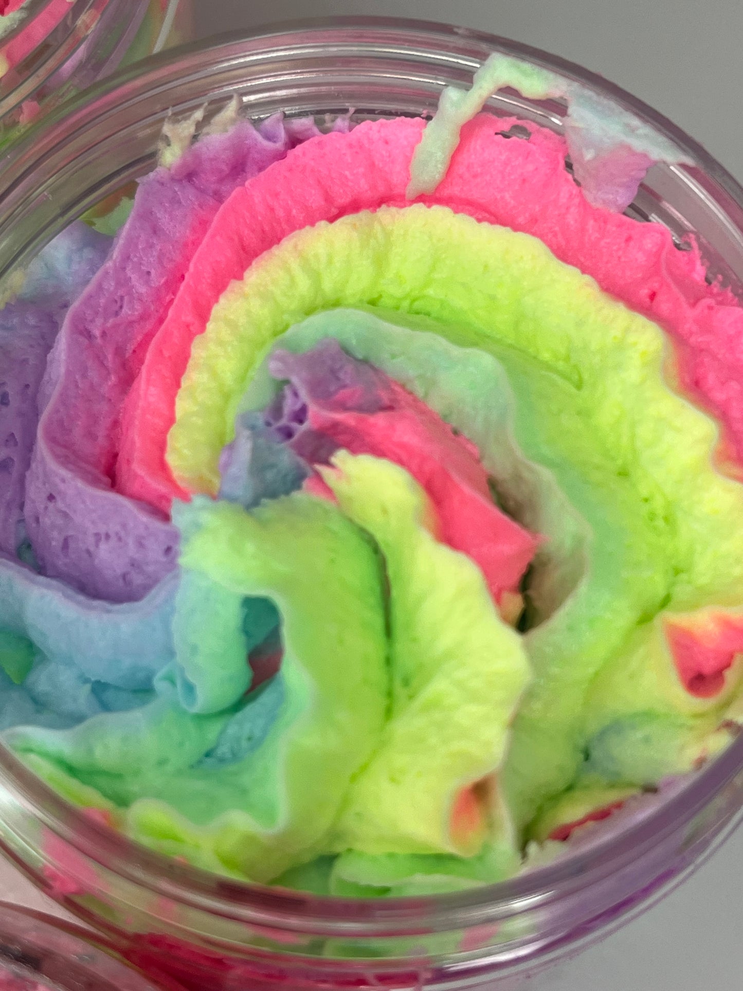 colourful unicorn scented whipped soap / shave butter. They turn your daily cleanse into a spa-like treat. Light, airy, and decadently whipped, our soaps are designed to cleanse, soften, and leave your skin feeling fresh and nourished. Use them as a body wash, shaving cream, or bath-time indulgence—they’re as versatile as they are luxurious.