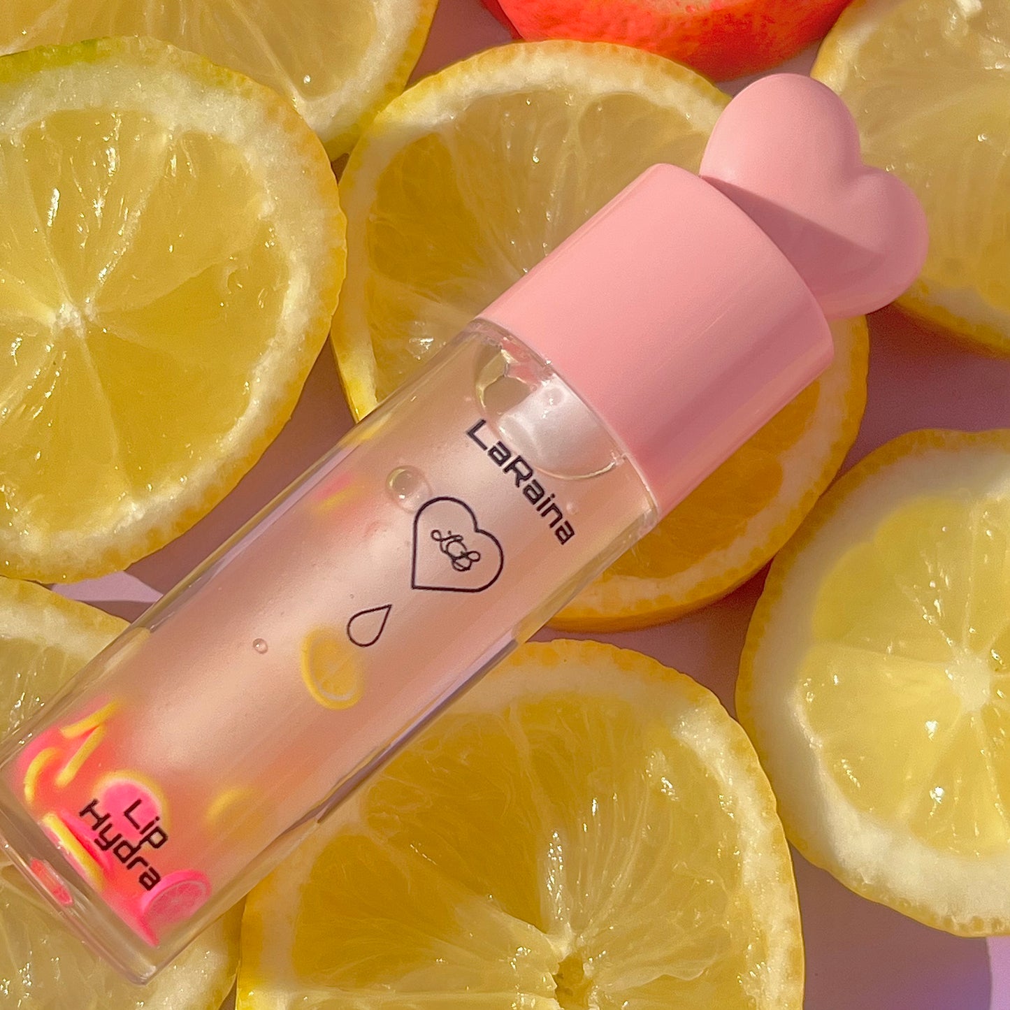 Pink Lemonade Glossy Lip Oil
Hydrating lip gloss–lip oil hybrid with a juicy pink lemonade scent, real citrus decals, and high-shine finish. Infused with castor oil and coconut oil for ultra-smooth, nourished lips. Lightweight, non-sticky, vegan and cruelty-free. Perfect for glossy, aesthetic, everyday lip care.