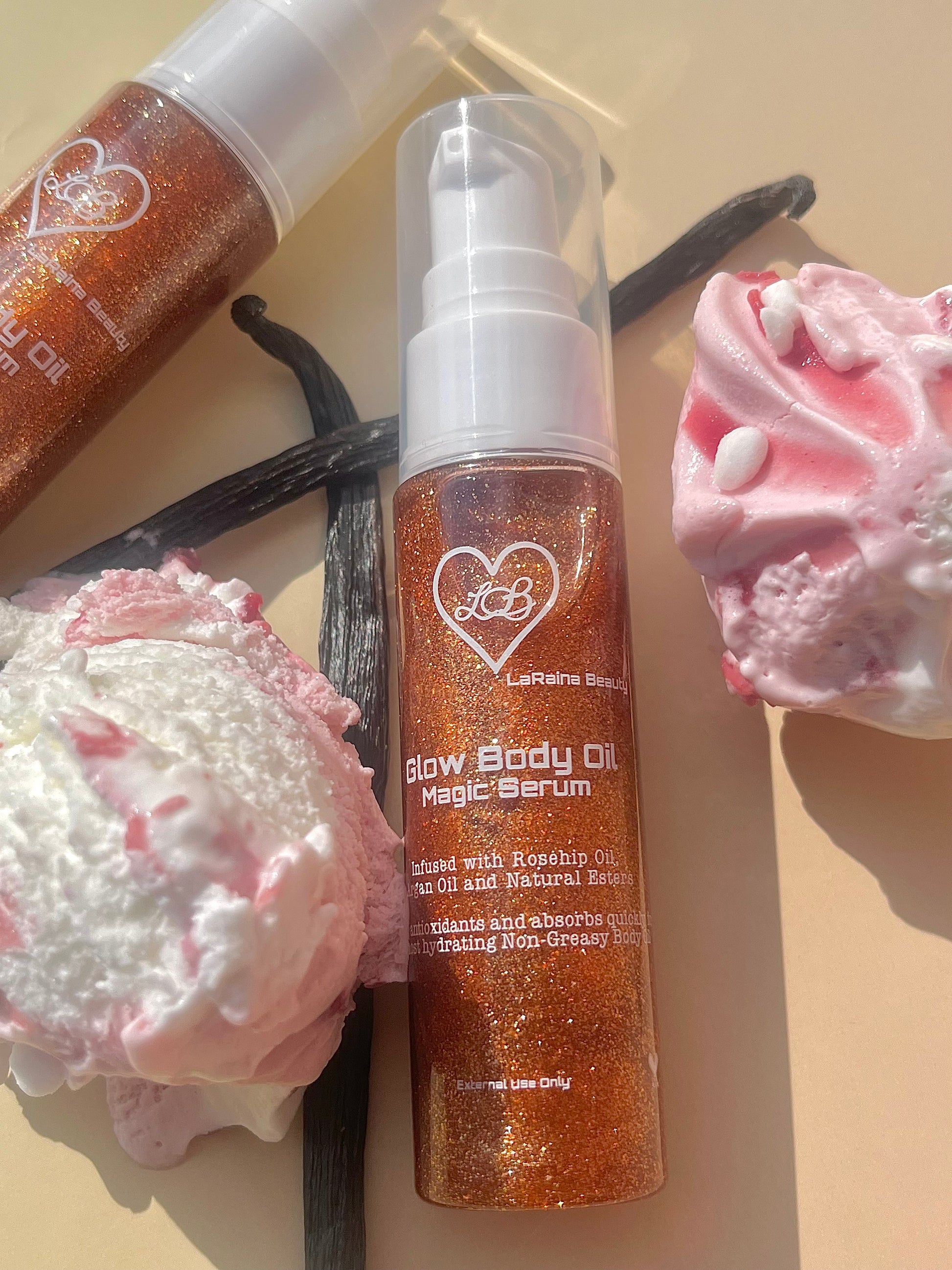 Bronze Heat is a Shimmer body oil with a soft gel texture, for an hydrating radiant skin that leaves a warm bronze golden glow. This glow elixir is Made with plant oils and biodegradable glitter, the luminous body care serum brings a captivating experience to life with a sweet raspberry ripple scent.