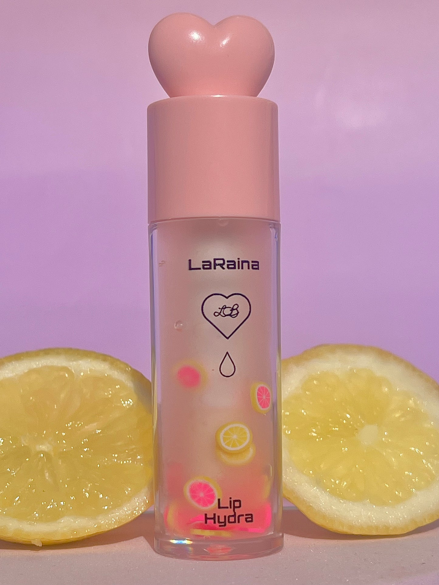 Pink Lemonade Glossy Lip Oil
Hydrating lip gloss–lip oil hybrid with a juicy pink lemonade scent, real citrus decals, and high-shine finish. Infused with castor oil and coconut oil for ultra-smooth, nourished lips. Lightweight, non-sticky, vegan and cruelty-free. Perfect for glossy, aesthetic, everyday lip care.