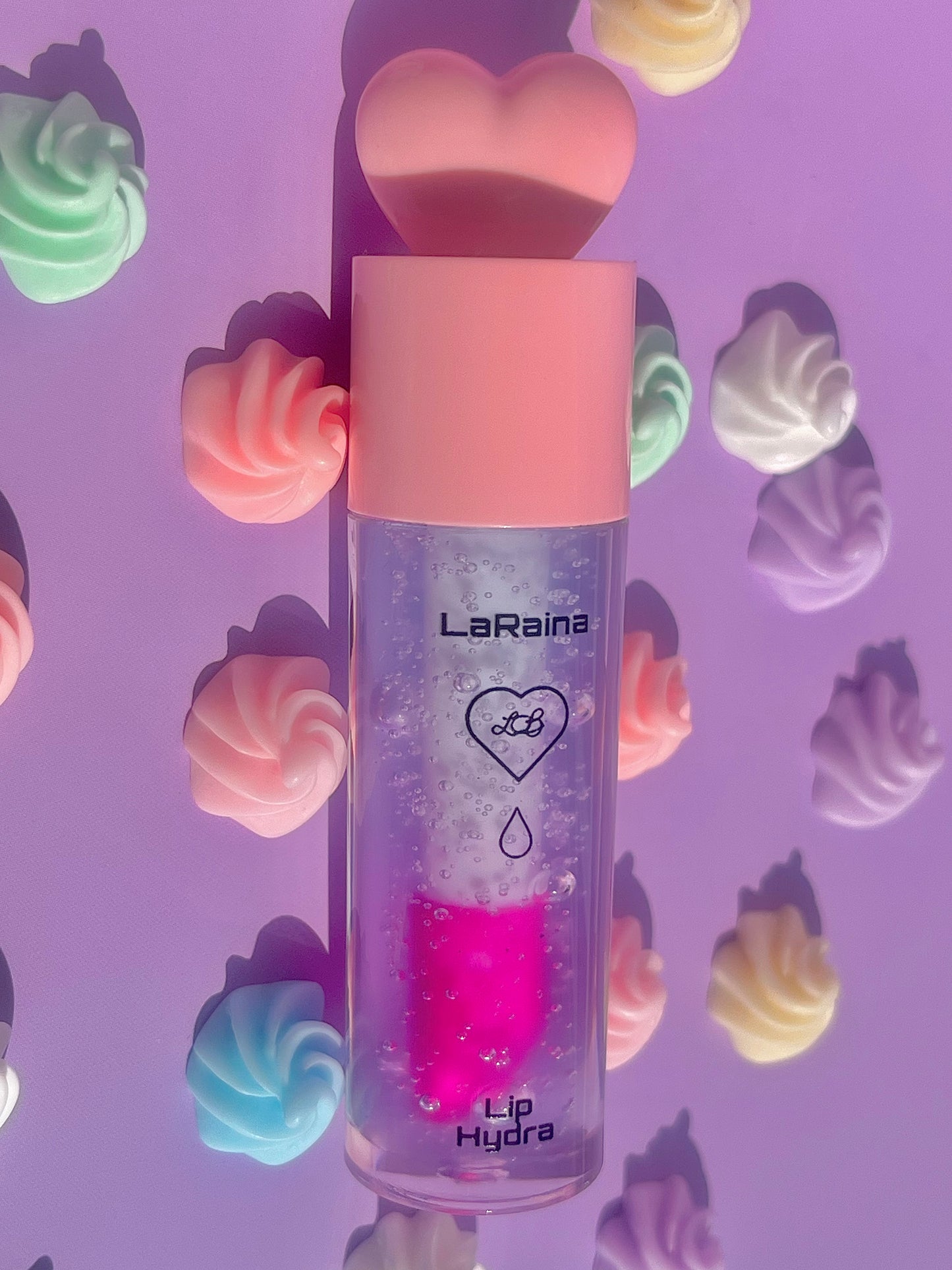 Color-changing pH-reactive lip gloss that starts blue and transforms into a custom pink. Provides deep hydration while adapting to your lips for a soft, personalised tint. Lightweight feel with lasting comfort and high shine.