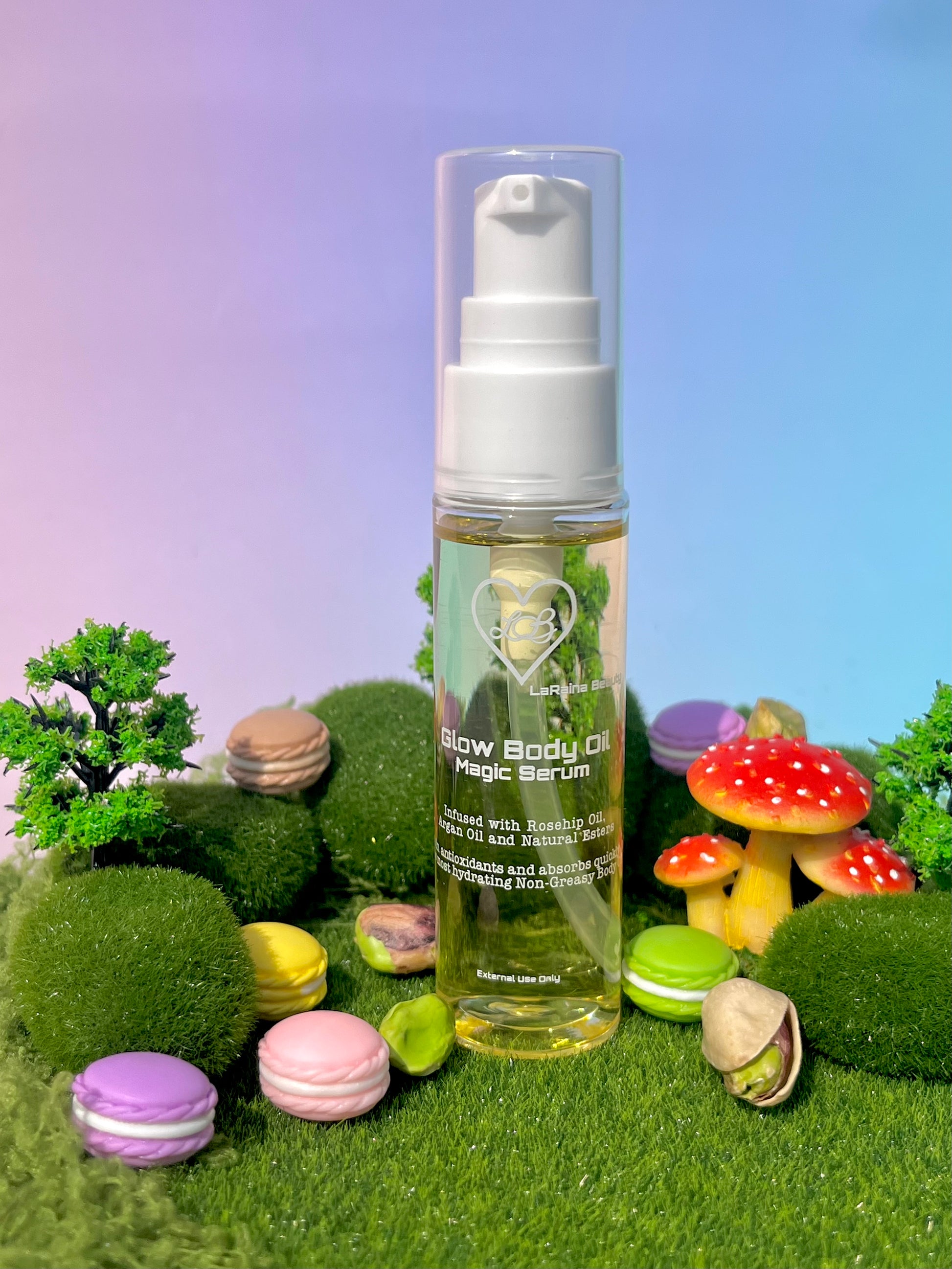 Body Oil bottle with white pump on a grassy background with colourful macarons and mushrooms