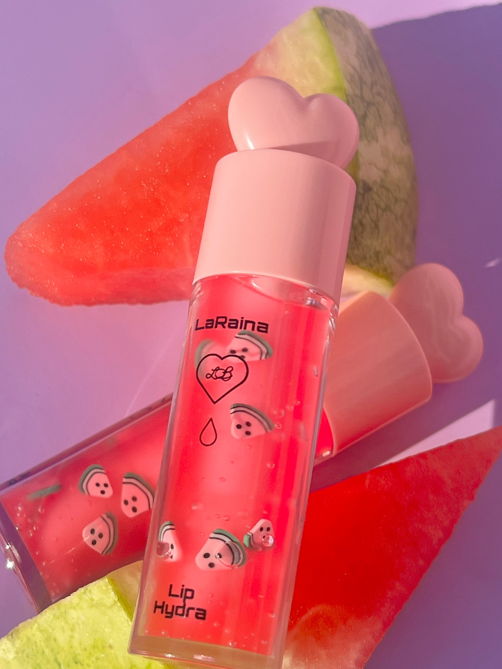 Juicy watermelon-flavoured lip gloss with a high-shine finish and summer-sweet scent. Soothes and softens lips while locking in moisture for hours of glossy wear. Lightweight and non-sticky for everyday hydration and glow.