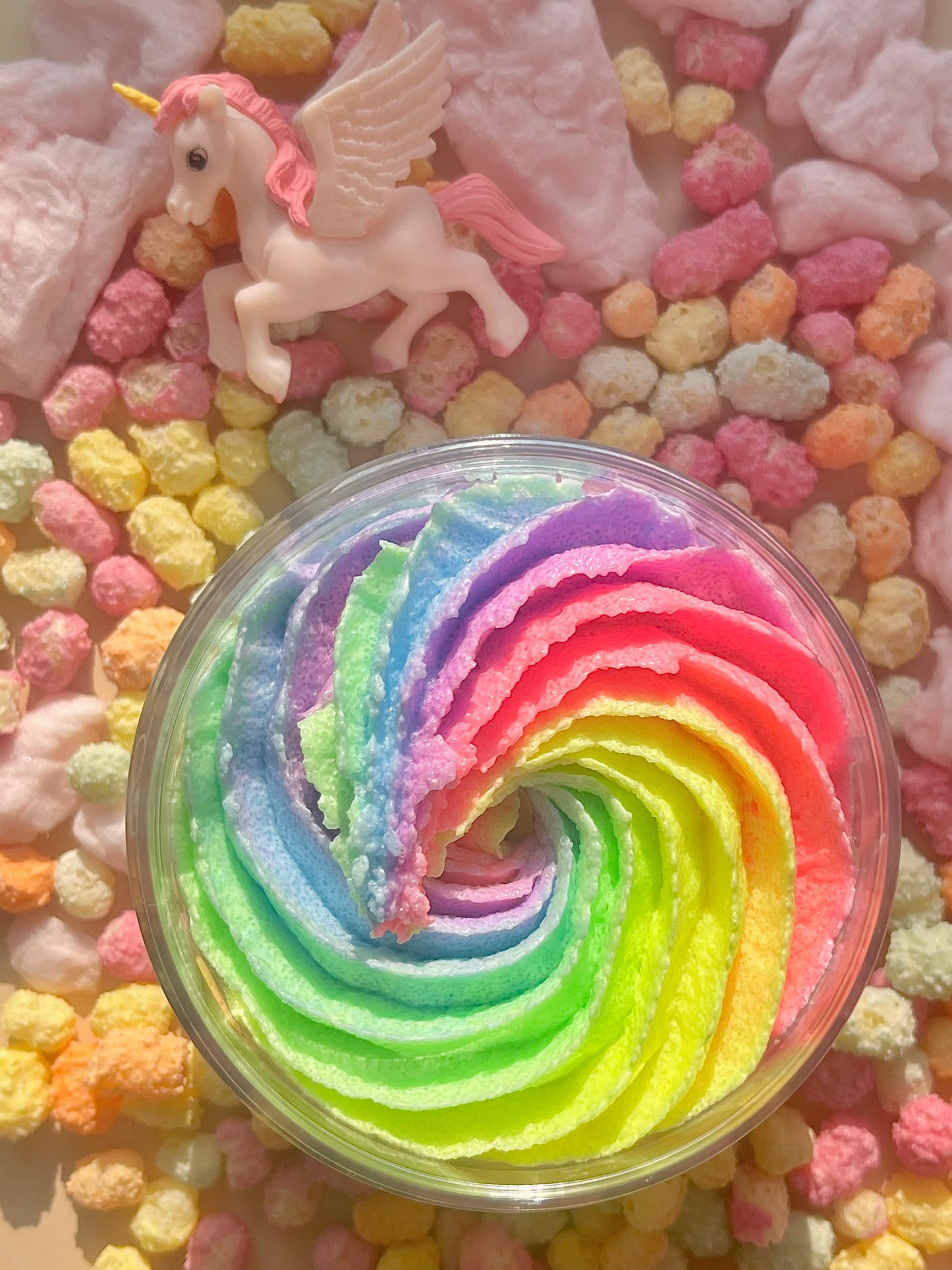 rainbow unicorn body scrub, sweet fruity body exfoliant. A foaming/cleansing and exfoliating gentle body scrub to achieve smooth soft skin. UK handmade Vegan skincare that brings a fun luxurious experience to self care and shower routines. Scrub and get rid of patchy dry skin, clogged pores and ingrown hairs. The best body scrub you could ever ask for.