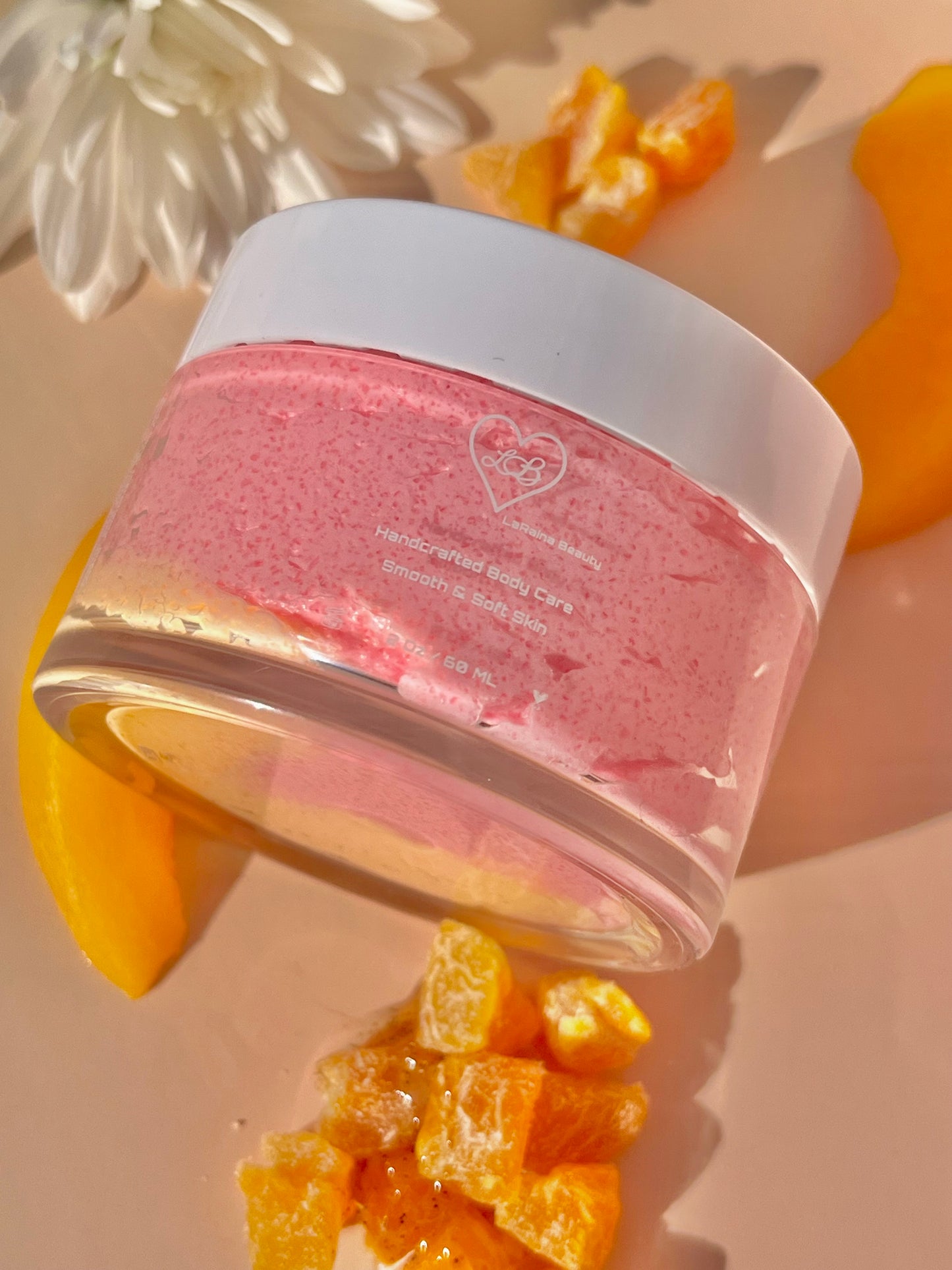 Peach fusion, mango and peach salsa juicy fruity body scrub. A foaming/cleansing and exfoliating gentle body scrub to achieve smooth soft skin. UK handmade Vegan skincare that brings a fun luxurious experience to self care and shower routines. Scrub and get rid of patchy dry skin, clogged pores and ingrown hairs. The best body scrub you could ever ask for.